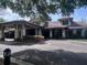 The clubhouse presents an inviting facade, providing a central hub for community events and social gatherings at 25962 High Hampton Cir, Sorrento, FL 32776