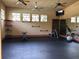 This spacious fitness center allows residents to exercise comfortably using the free weights and various machines available at 25962 High Hampton Cir, Sorrento, FL 32776