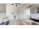 Open living area with a mirrored wall, comfortable seating, and stylish decor enhancing its appeal at 25962 High Hampton Cir, Sorrento, FL 32776