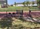 A well-maintained community tennis court invites residents to engage in friendly matches and active recreation at 25962 High Hampton Cir, Sorrento, FL 32776