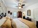 Spacious bedroom featuring floral wallpaper and wooden furniture at 2756 Sequoyah Dr, Haines City, FL 33844