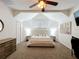 Comfortable bedroom featuring neutral tones, carpeted floor, and closet storage at 2756 Sequoyah Dr, Haines City, FL 33844