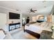 Large main bedroom featuring a comfortable bed, elegant decor, and access to an ensuite bathroom at 2756 Sequoyah Dr, Haines City, FL 33844