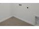 The laundry room has tile floors and utility connections for laundry machines at 2980 Supermarine Rd, Tavares, FL 32778