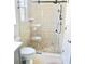 Modern bathroom featuring a glass shower door, ceramic tile, and sleek, black fixtures at 3275 Oak Brook Ln, Eustis, FL 32736