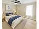 Bedroom featuring a bed, soft lighting, and a window for natural light at 3275 Oak Brook Ln, Eustis, FL 32736