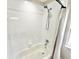 Clean shower stall with adjustable head and white tiling at 3275 Oak Brook Ln, Eustis, FL 32736
