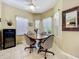 This sunny breakfast nook with great lighting is perfect for Gathering meals at 3551 Mulberry Grove Loop, Leesburg, FL 34748