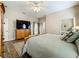 A well-lit main bedroom with plenty of space for furniture at 3551 Mulberry Grove Loop, Leesburg, FL 34748