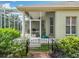 Enclosed patio with a garden view, offering a relaxing outdoor space at 3551 Mulberry Grove Loop, Leesburg, FL 34748