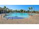 Enjoy a refreshing swim in this community pool surrounded by palm trees and ample seating at 3656 Solana Cir # A, Clermont, FL 34711