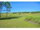 Expansive green space perfect for outdoor activities at 3656 Solana Cir # A, Clermont, FL 34711