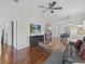 Stylish living room features a TV, sleek furniture, and an open floor plan at 3656 Solana Cir # A, Clermont, FL 34711