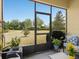 Enjoy the outdoor living space of this screened patio with backyard views at 3656 Solana Cir # A, Clermont, FL 34711