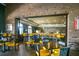 Upscale restaurant featuring a brick wall, overhead lighting, and bar with comfortable and stylish seating at 368 Alcove Dr, Groveland, FL 34736