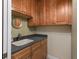 Bathroom features a vanity with a sink and storage cabinets at 39023 Griffin Lndg, Lady Lake, FL 32159