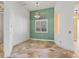 Bright dining room with a decorative light fixture, a window, and tile flooring at 39023 Griffin Lndg, Lady Lake, FL 32159