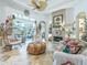 Inviting living room features tile floors, a brick fireplace, and stylish furniture for relaxation and enjoyment at 39023 Griffin Lndg, Lady Lake, FL 32159