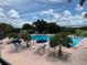 Enjoy this beautiful pool with a view of the lake at 39023 Griffin Lndg, Lady Lake, FL 32159