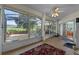 Screened lanai offering outdoor living with views of the backyard at 4717 Inverness Dr, Leesburg, FL 34748