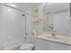 Bathroom showing a tub and shower combination, vanity, and neutral wall color at 5300 S Atlantic Ave # 16-202, New Smyrna Beach, FL 32169
