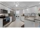 Modern kitchen featuring stainless steel appliances and granite countertops at 5300 S Atlantic Ave # 16-202, New Smyrna Beach, FL 32169