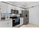 Bright kitchen featuring stainless steel appliances and granite countertops at 5300 S Atlantic Ave # 16-202, New Smyrna Beach, FL 32169