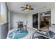 Screened lanai with comfortable seating and an outdoor table with views into the home at 5300 S Atlantic Ave # 16-202, New Smyrna Beach, FL 32169