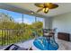 Screened lanai showing outdoor seating and table with natural views at 5300 S Atlantic Ave # 16-202, New Smyrna Beach, FL 32169