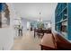Spacious living area featuring an open floor plan, tile floors, and natural light at 5300 S Atlantic Ave # 16-202, New Smyrna Beach, FL 32169