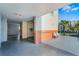 Relaxing outdoor patio space with comfortable seating and a view of lush palm trees at 5300 S Atlantic Ave # 16-202, New Smyrna Beach, FL 32169