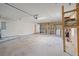 Spacious garage with shelving, ample storage, and modern appliances providing functionality and convenience at 548 E Belt Ave, Bushnell, FL 33513