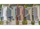 Aerial image displays property lines and positioning of home, lawns and landscaping at 5702 Grimes Ct, The Villages, FL 32163