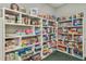 The game room features shelves filled with puzzles and games at 5906 Prince Philip Ct, Leesburg, FL 34748