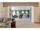 Bright sunroom with furniture and view to the outdoors at 630 Laurel Run, The Villages, FL 32162