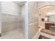 Large walk-in closet with wire shelving adjacent to the main bedroom at 630 Laurel Run, The Villages, FL 32162