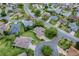 A stunning aerial view highlighting the meticulously landscaped properties and peaceful cul-de-sacs of the residential area at 725 Beldon Ct, The Villages, FL 32162