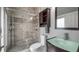 Modern bathroom featuring a glass shower and vanity, creating a sleek design at 7973 Lake Nellie Rd, Clermont, FL 34714