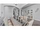 Inviting dining room with rustic wood table, seating for eight and elegant buffet at 7973 Lake Nellie Rd, Clermont, FL 34714
