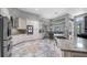 Gourmet kitchen with granite countertops, stainless steel appliances, and ample cabinet space at 7973 Lake Nellie Rd, Clermont, FL 34714