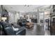 Open floor plan showcasing living room with fireplace, kitchen, and dining area at 7973 Lake Nellie Rd, Clermont, FL 34714