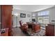 Home office space featuring a large desk, leather chair, and natural lighting at 7973 Lake Nellie Rd, Clermont, FL 34714