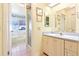 Well-maintained bathroom featuring a shower stall and a bathtub, complemented by a vanity area at 915 Sutherland Ct, Leesburg, FL 34788