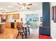 Eat-in kitchen featuring bright light and a ceiling fan at 915 Sutherland Ct, Leesburg, FL 34788