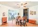 Bright dining area with a round table and chairs, and a ceiling fan at 915 Sutherland Ct, Leesburg, FL 34788