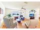 Open living room featuring lots of seating and a ceiling fan at 915 Sutherland Ct, Leesburg, FL 34788