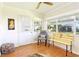 Well lit sunroom with neutral paint and garden view windows at 915 Sutherland Ct, Leesburg, FL 34788