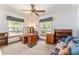 Bedroom or office featuring two bright windows and plenty of space for a work-from-home setup or a guest room at 10159 Se 174Th St, Summerfield, FL 34491