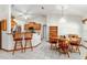 Open concept kitchen with stainless steel appliances, and a dining area at 10159 Se 174Th St, Summerfield, FL 34491