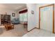 Inviting living room with a sofa, arm chair, coffee table, and natural light for a cozy ambiance at 10159 Se 174Th St, Summerfield, FL 34491